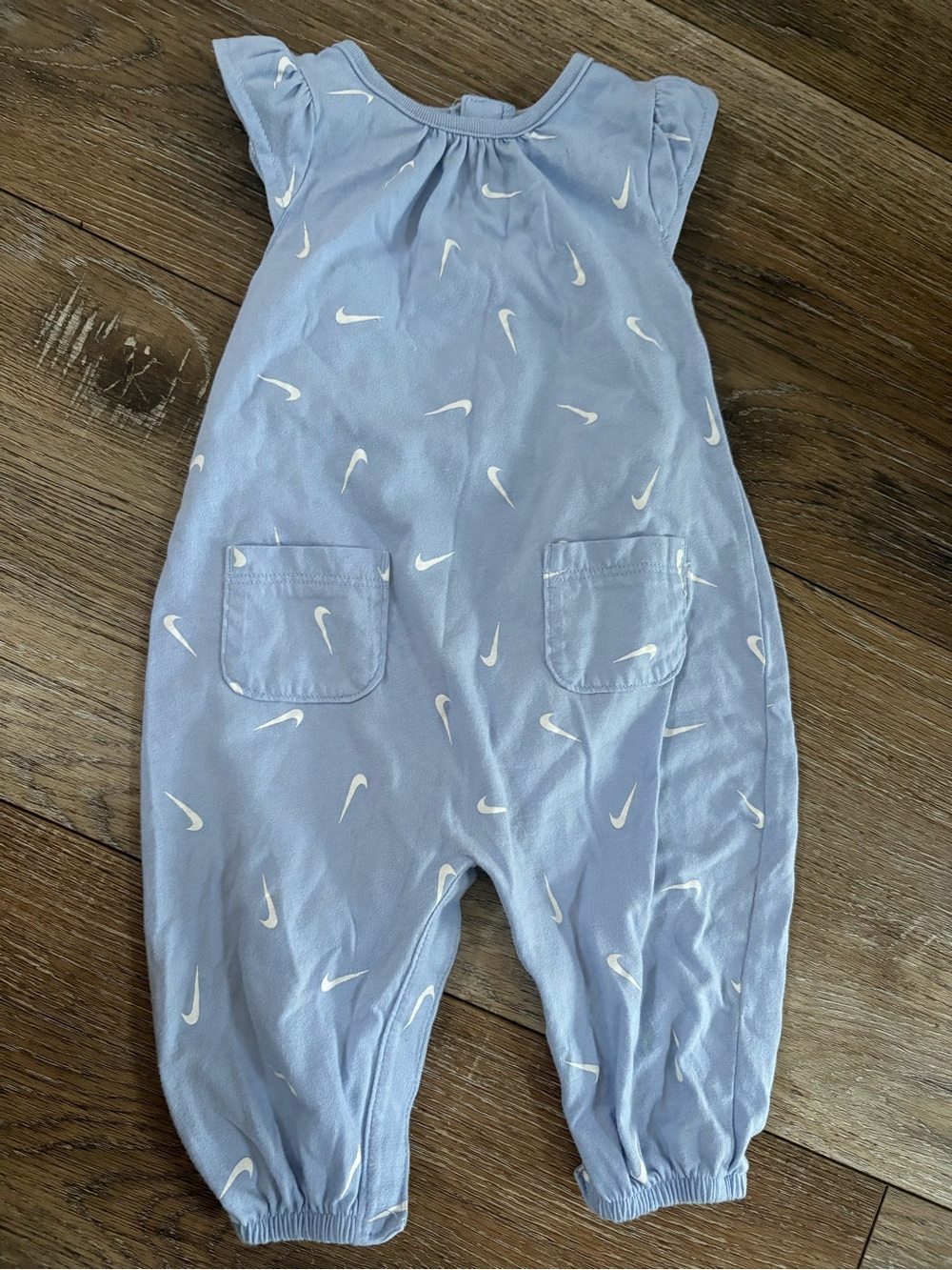 Nike Light Blue Baby One-Piece Romper with White Swoosh Pattern - Picture 1 of 2